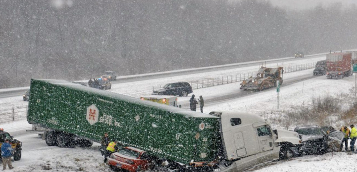 Truck driving accident on icy freeway